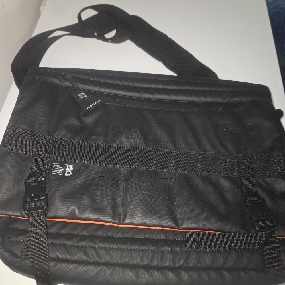 Under Armour Black and Orange Messenger Bag with Sporty Design